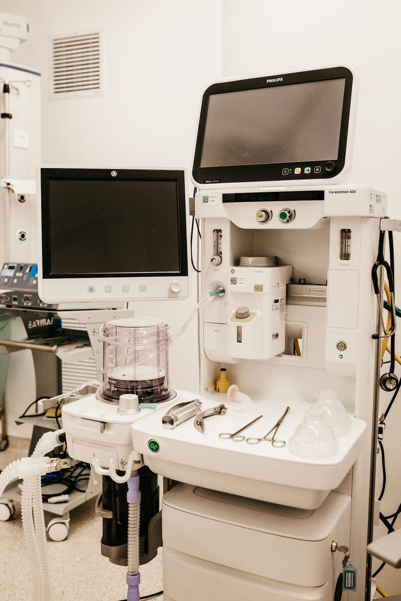 Hospital equipment with a monitor, ready for servicing.